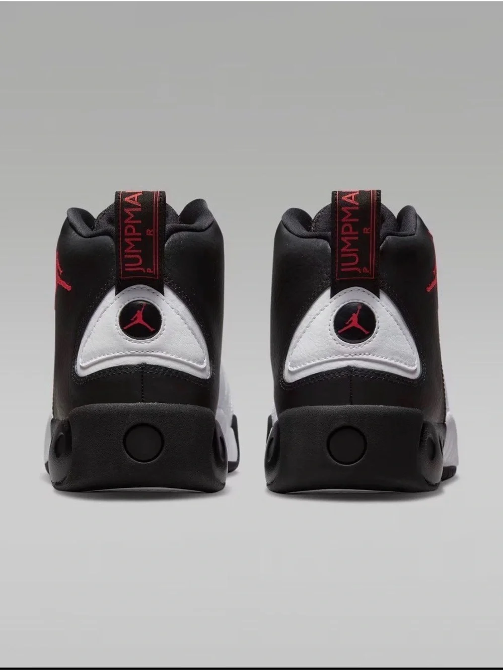Jordan Men’s Mid Sneaker - Black/White/Red New. Original box is broken.